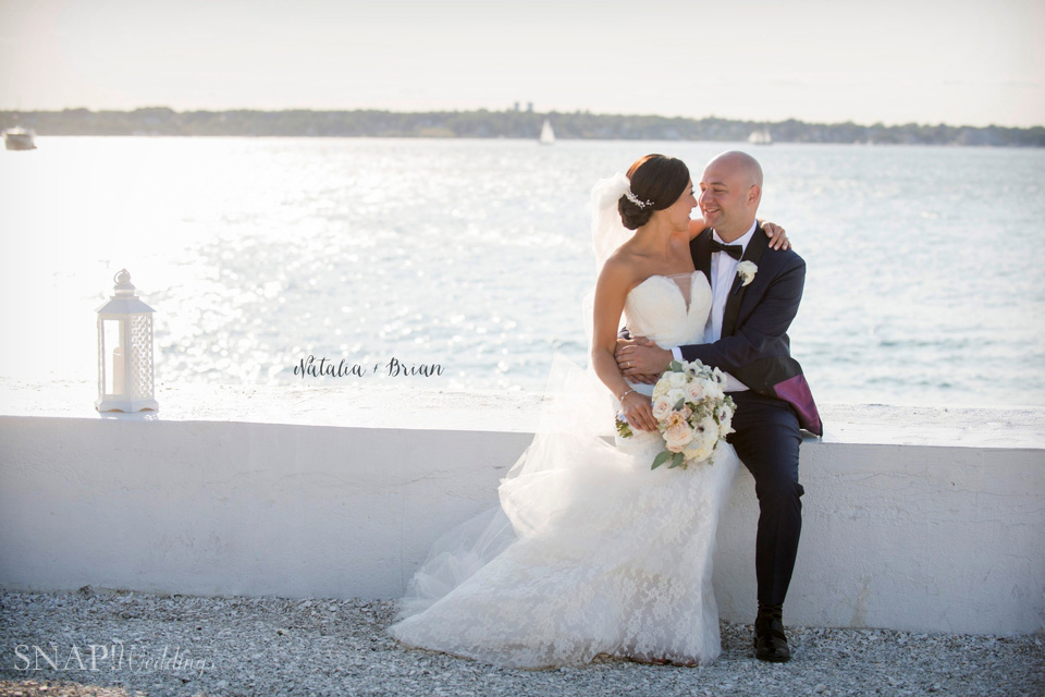 Bride and Groom enjoy the view at their Belle Mer Wedding