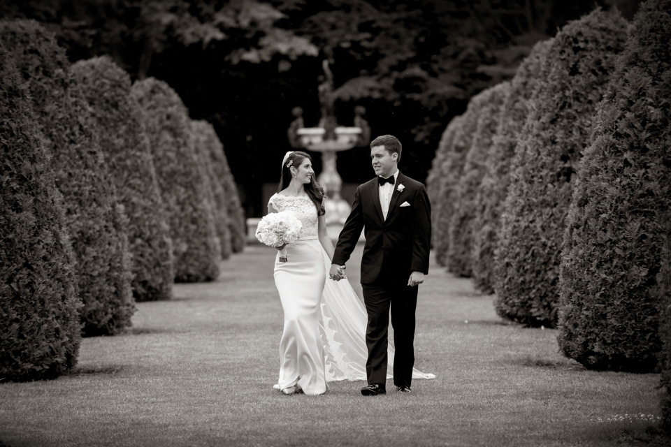 Bride and Groom stroll the grounds at the Elms Mansion